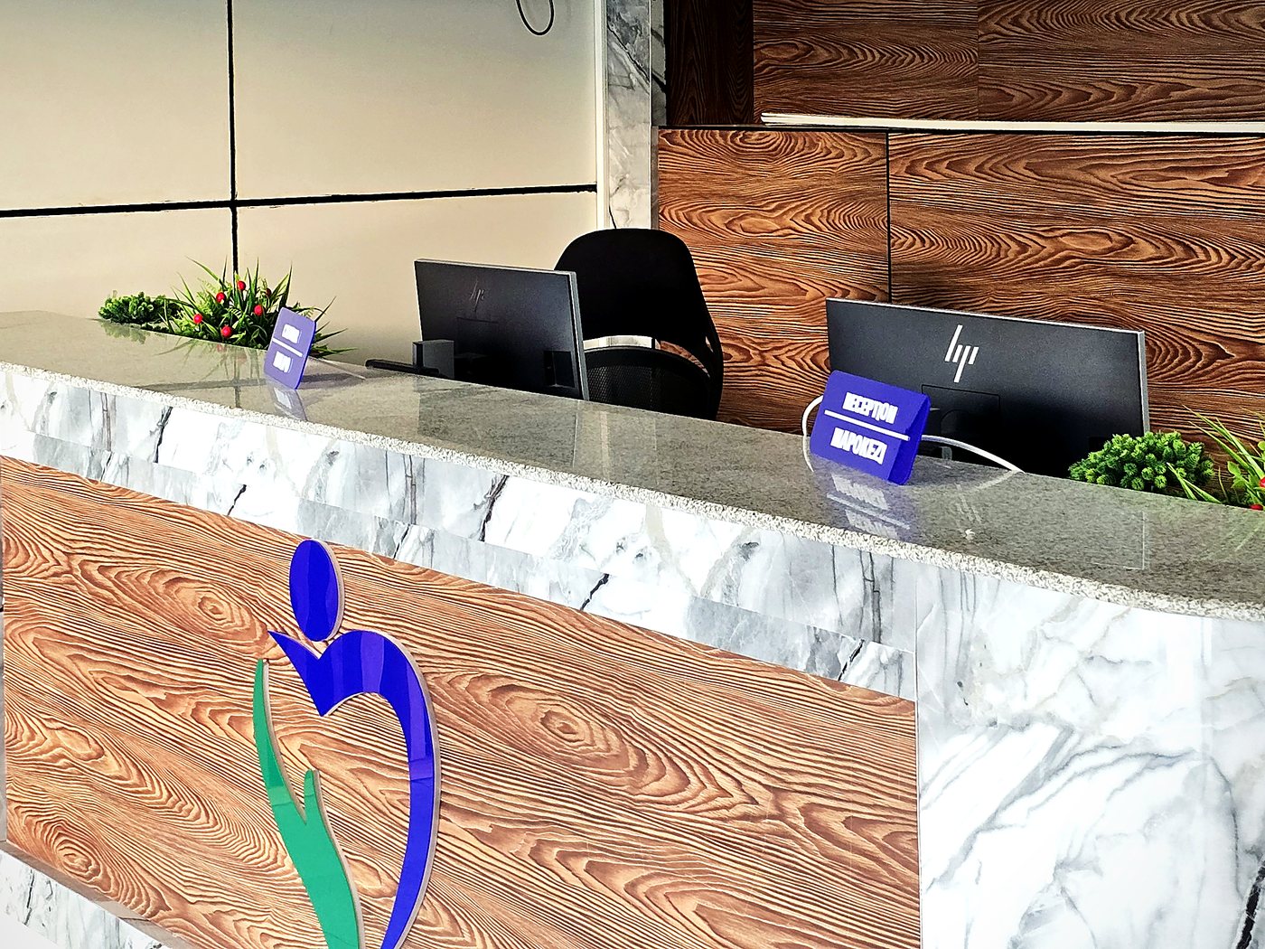 The reception counter at MacWish Medical Centre, Mwanza